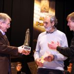 L'Ensemble, sota la direcció de Fernando Cantó Salinas, foren els encarregats d'encetar la vetlada musical amb 3 peces magistrals. Aquesta formació va nàixer per iniciativa de l'Escola de música tradicional de la ciutat de València, amb la finalitat d'estudiar, fomentar i innovar a l'àmbit de la cultura i la música tradicional valenciana. Tot i la seua joventut, l'Ensemble està format per músics veterans que avalen la qualitat i el prestigi de cada so a les composicions. Al Tall rep el reconeixement 'Passet a Passet' a l'onzé Festival de Colles de Cocentaina